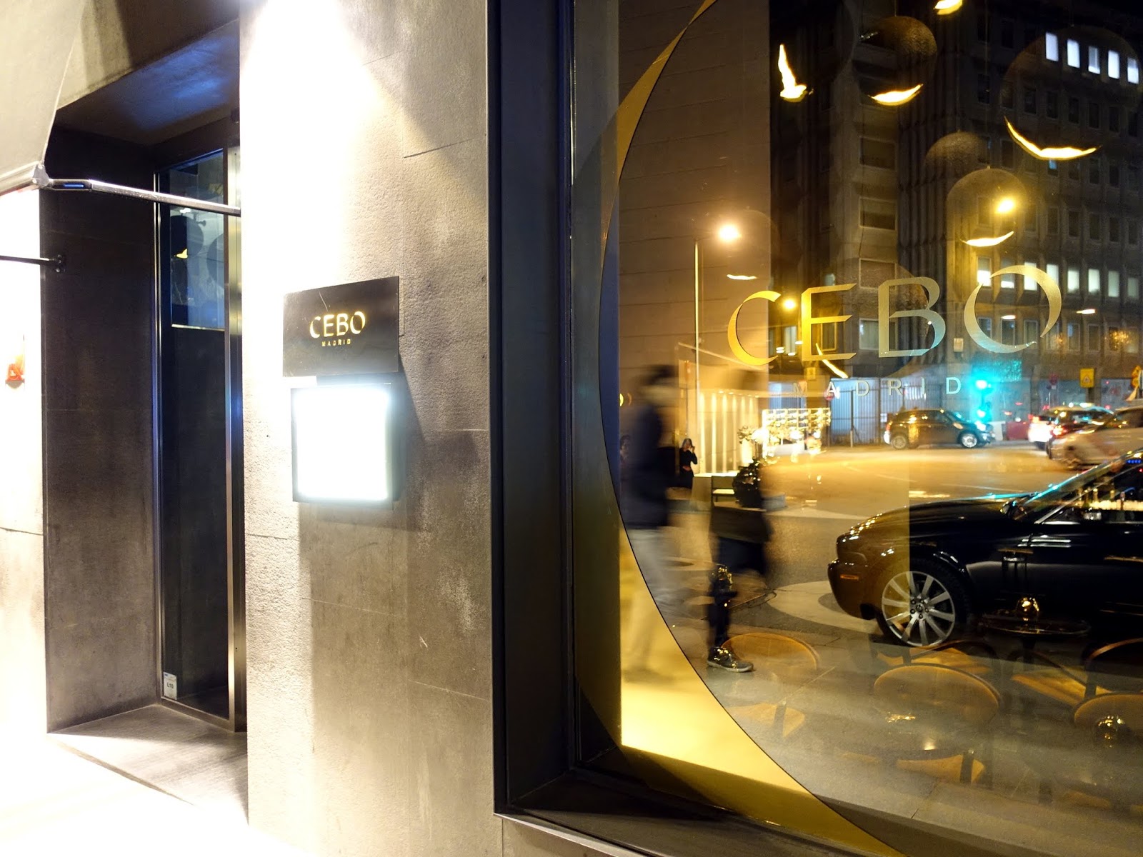 Sleek entrance of CEBO Restaurant at Hotel Urban, ideal for corporate events and gatherings.
