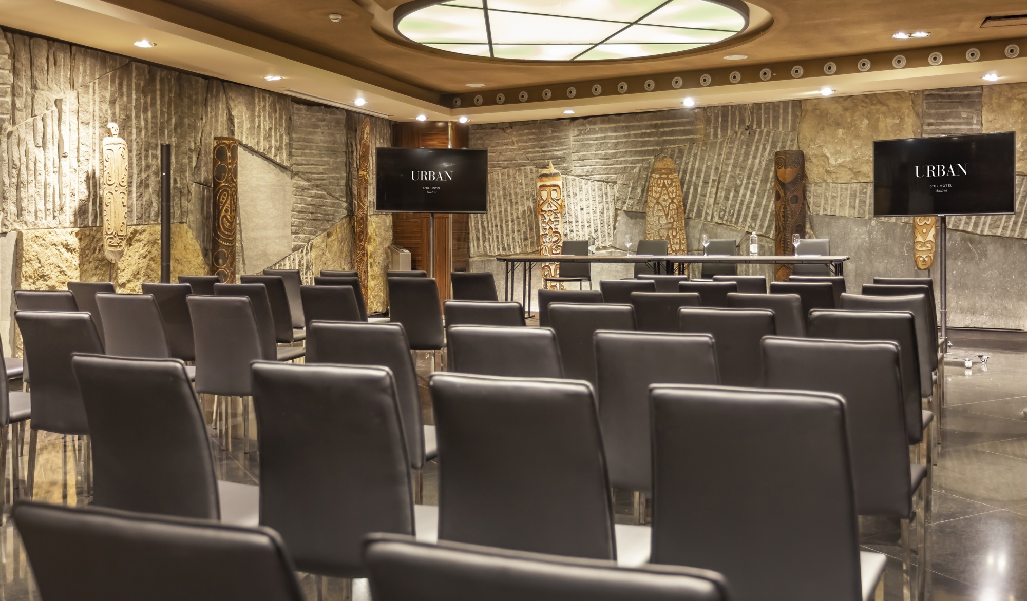 Modern conference room in Hidden Wine Cellar, Hotel Urban - ideal for corporate meetings.