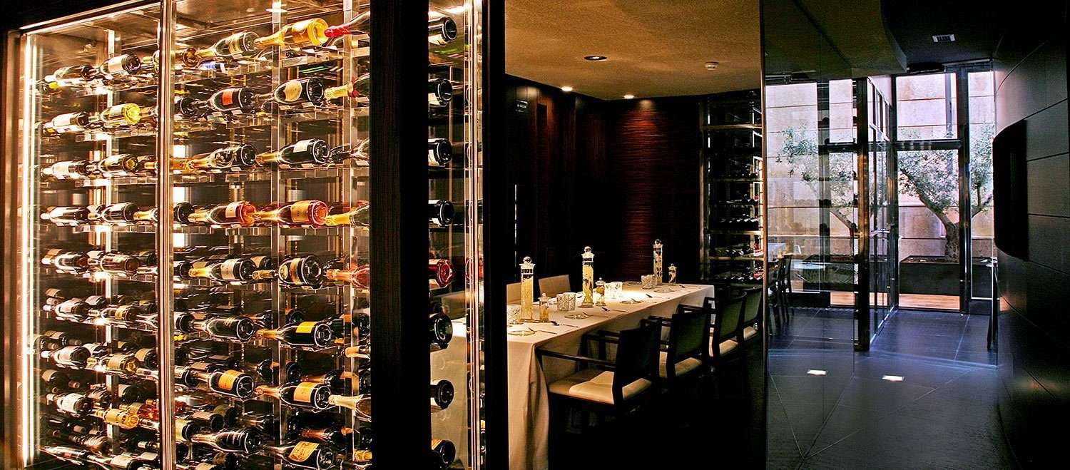 Elegant Hidden Wine Cellar dining space for corporate dinners and exclusive events.