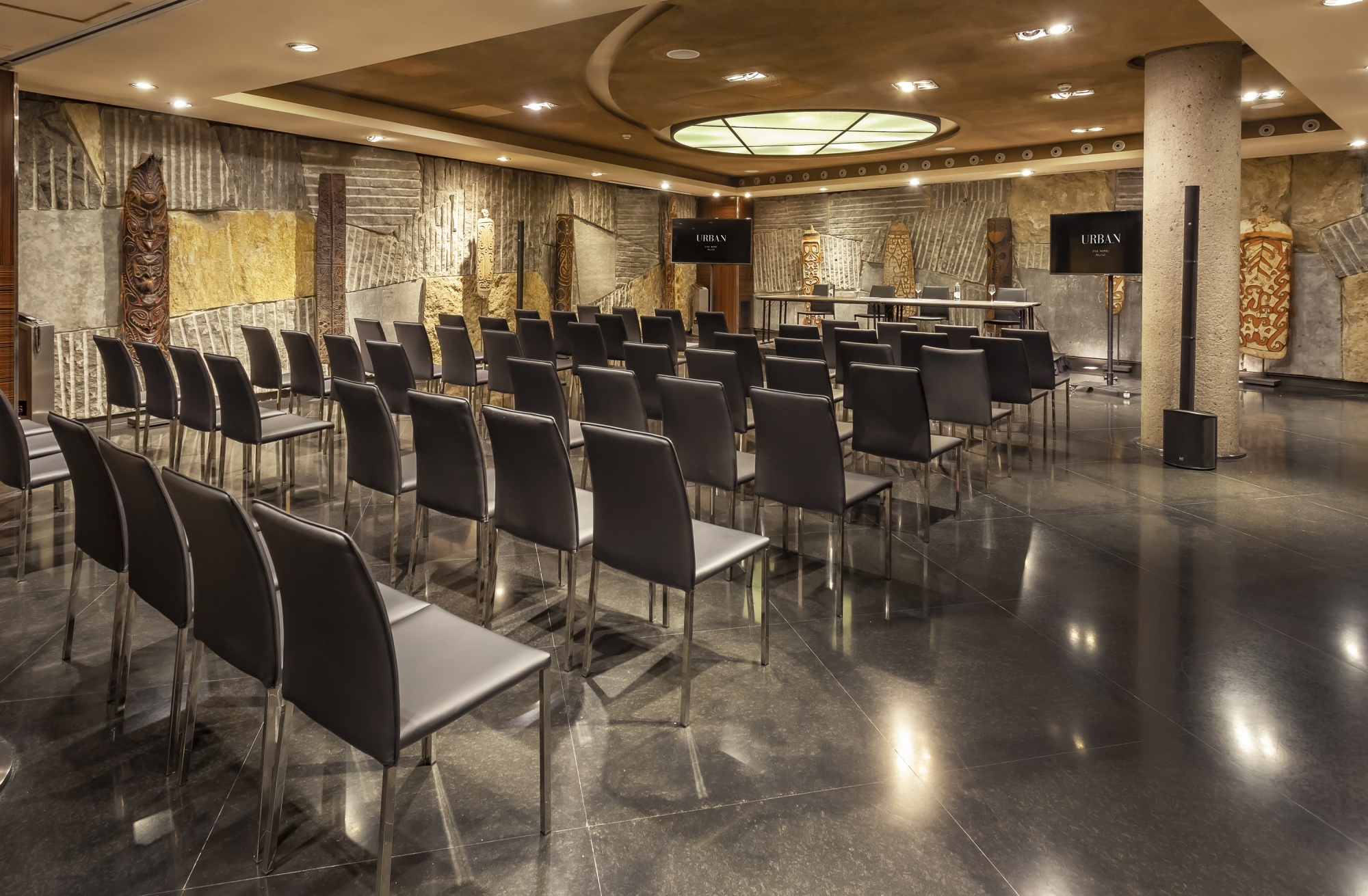 Sophisticated Hidden Wine Cellar event space with modern seating for meetings and presentations.