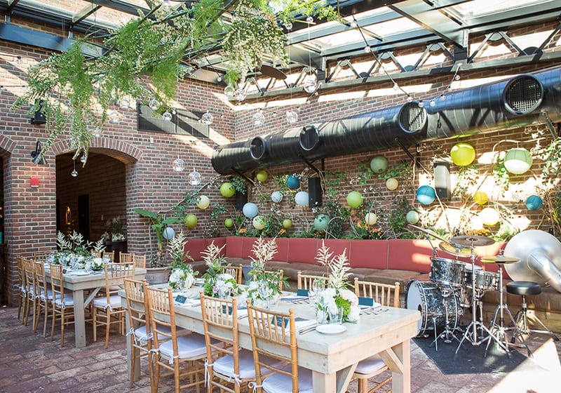 Vibrant Rooftop Bar at Refinery Hotel, perfect for events and celebrations.