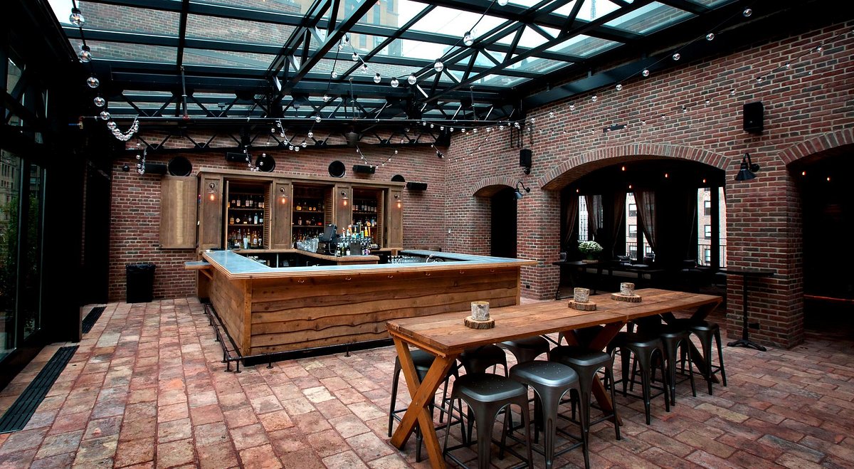 Stylish rooftop bar at Refinery Hotel, perfect for cocktail receptions and networking events.