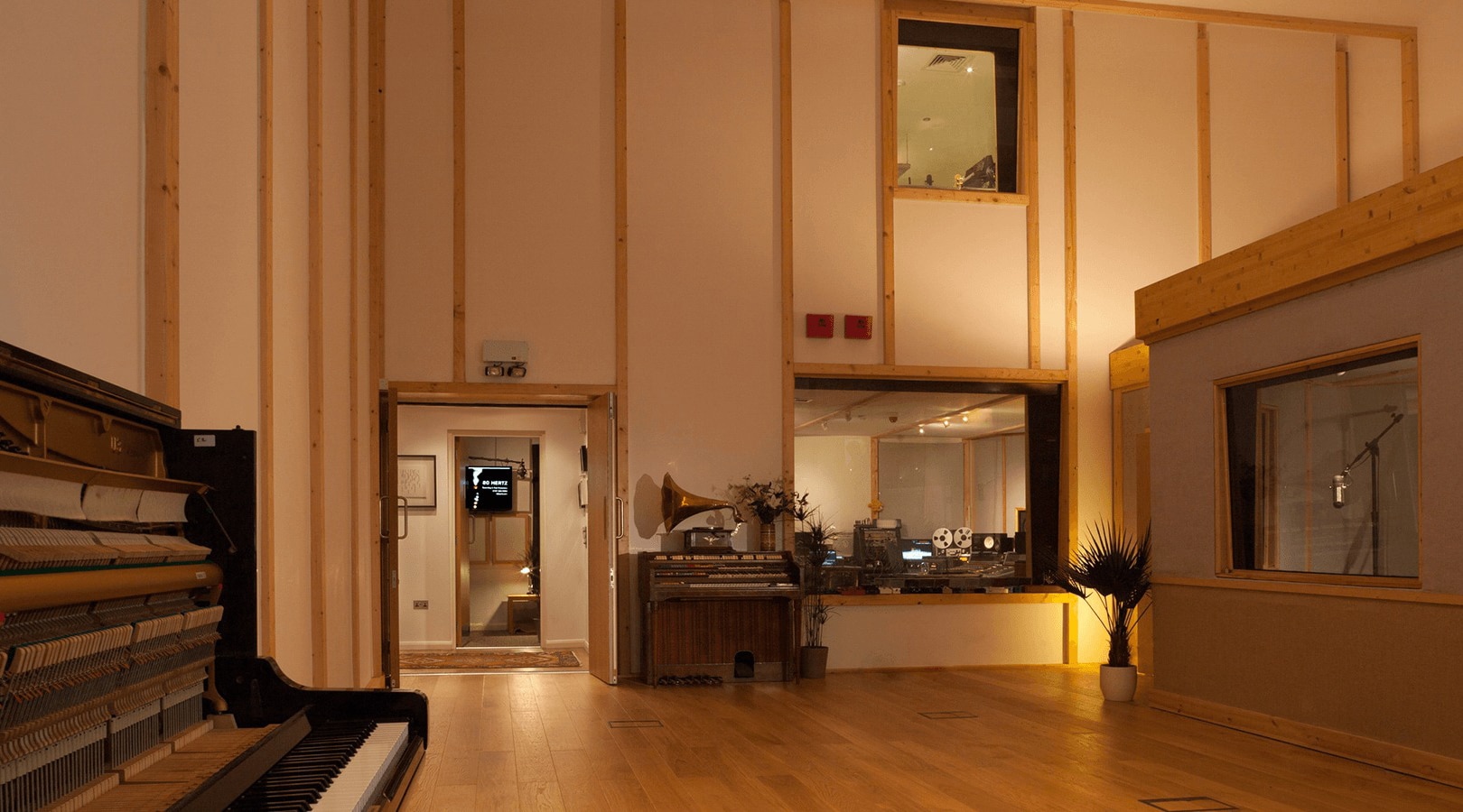 "Versatile event space with natural light at Jefferson Live Room, ideal for workshops and performances."