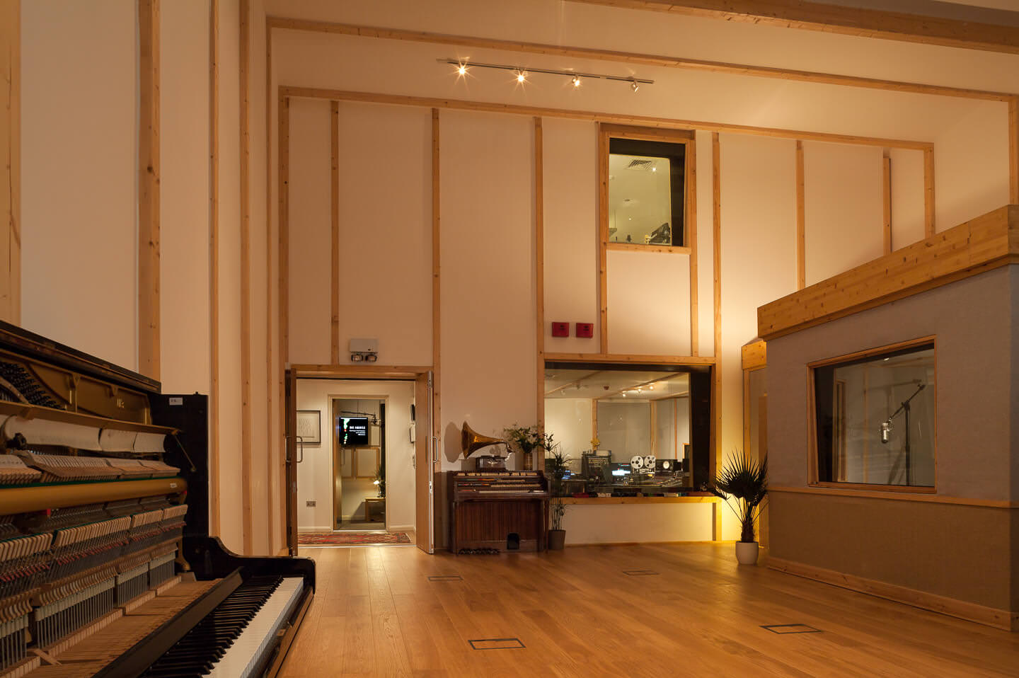 Spacious ADR Sound Stages meeting space with warm wood accents for creative events.