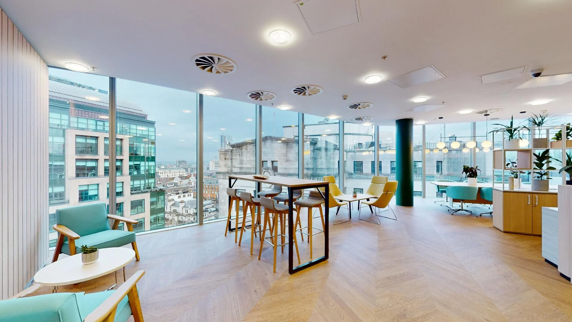 Modern coworking meeting space with large windows in Manchester City Centre.