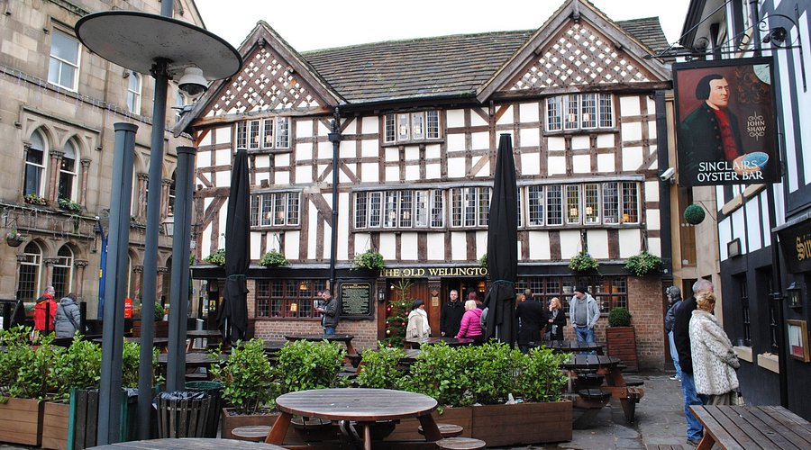 Charming timber-framed pub in Manchester, ideal for networking events and casual meet-ups.