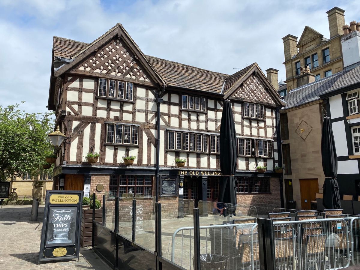 Historic timber-framed pub in Manchester, ideal for unique meetings and events.