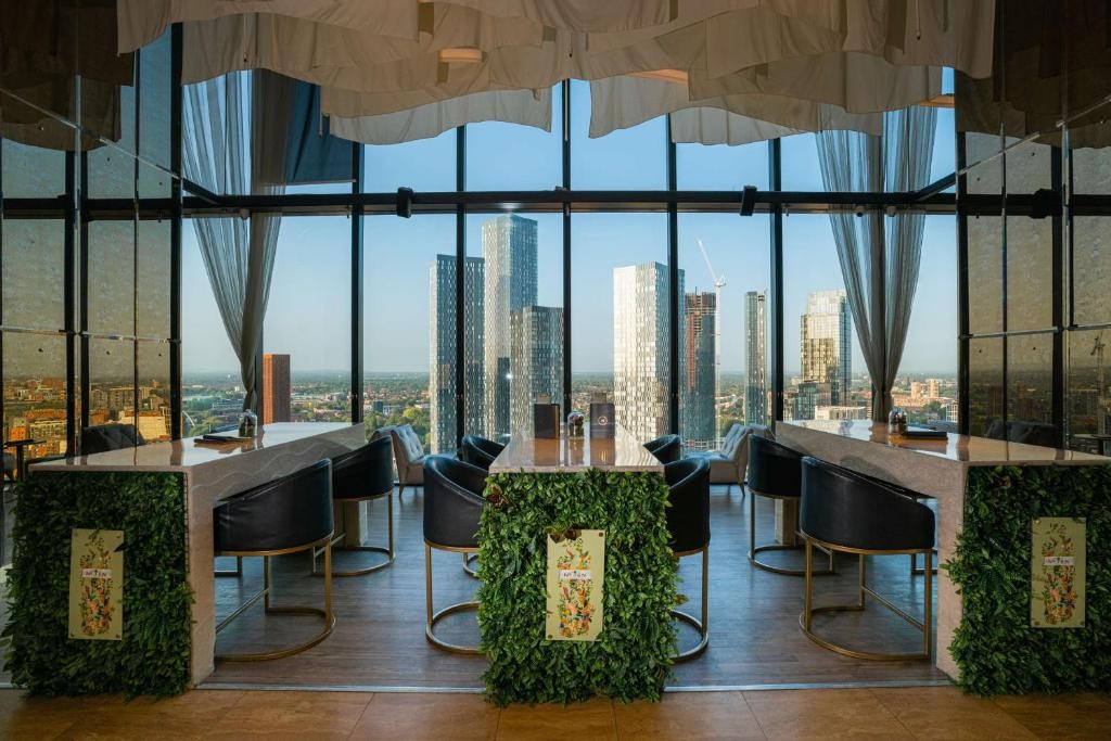 "Cloud23 function room with panoramic city views for upscale meetings and networking events."
