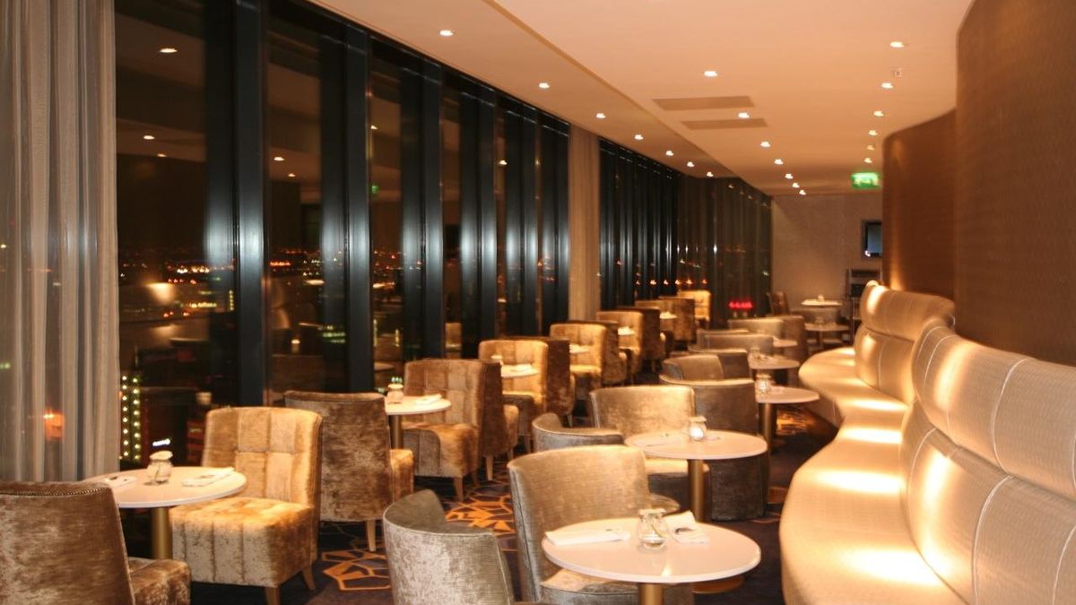 Elegant Zeus Lounge in Cloud23, perfect for cocktail receptions and intimate gatherings.