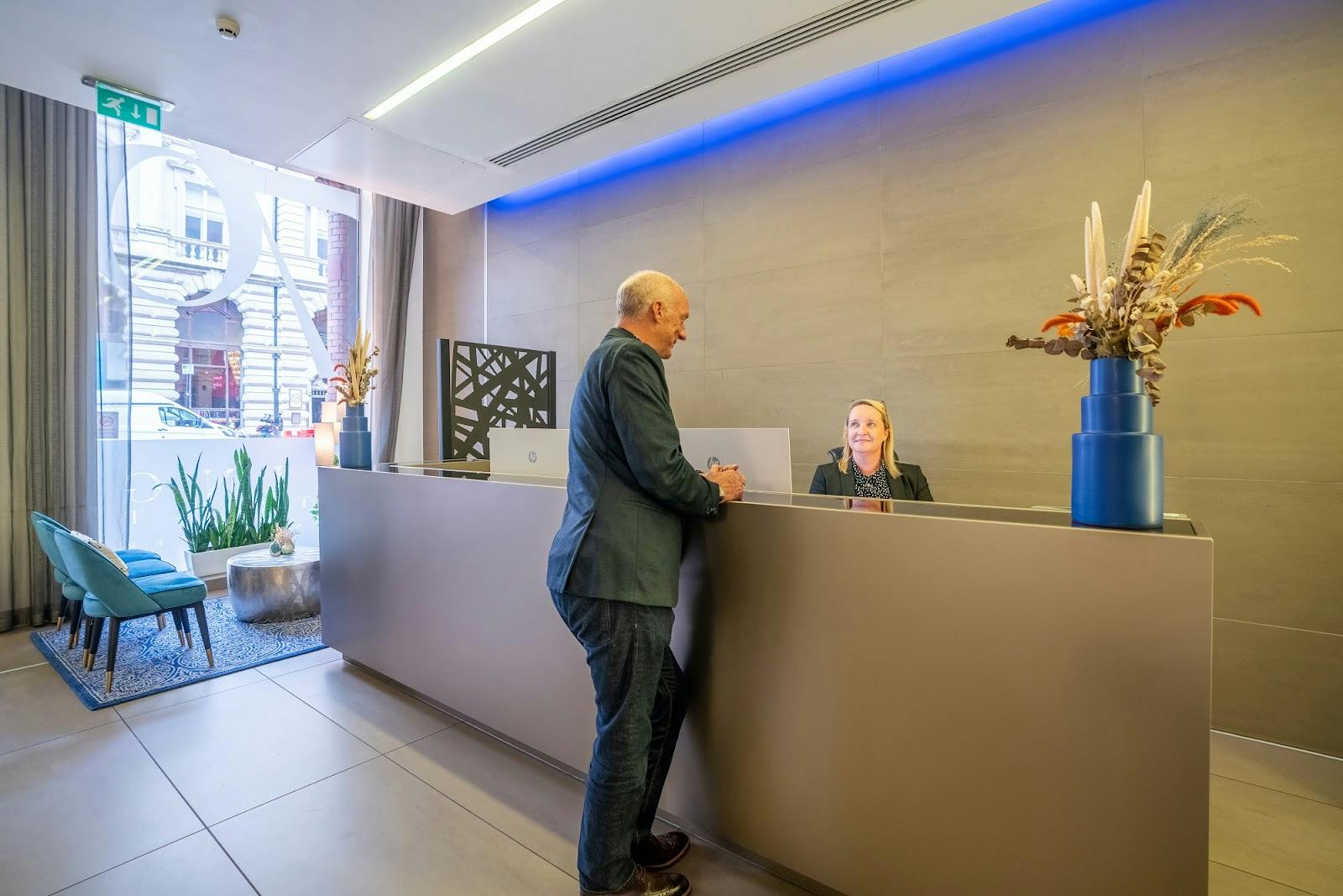 "Modern reception area in Orega King Street for events, featuring welcoming design and natural light."