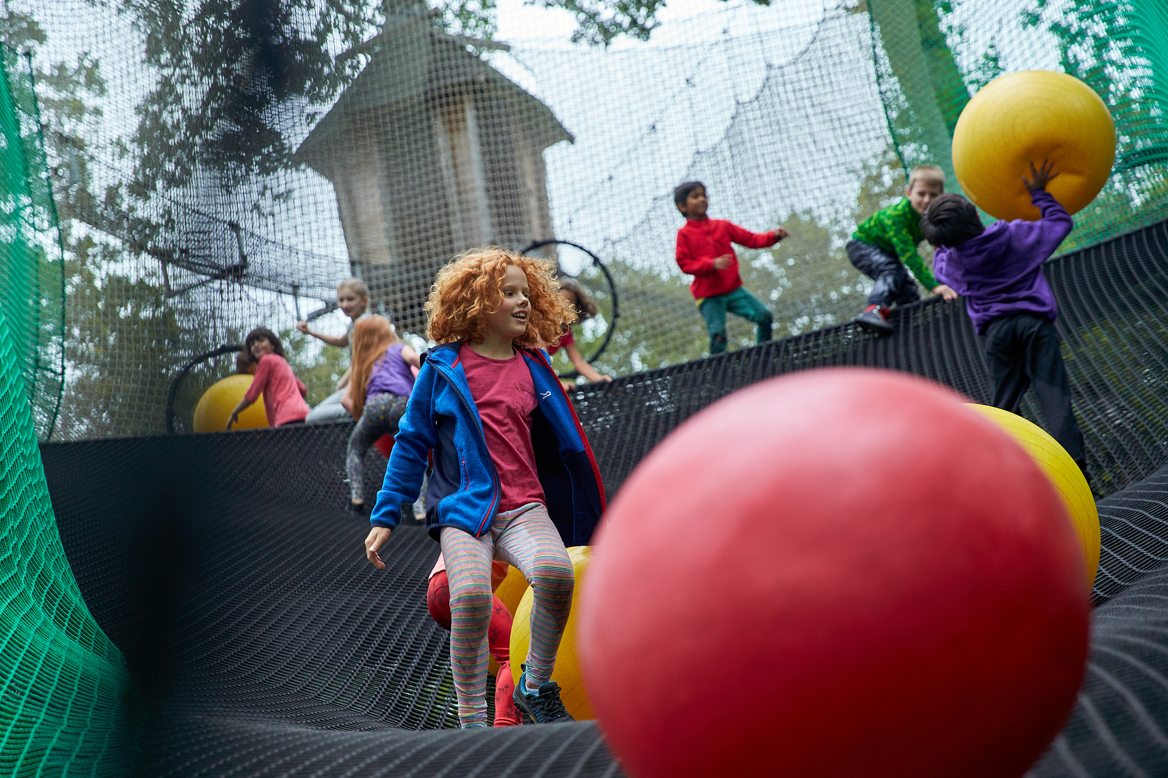 Vibrant Nets Adventure play area at Go Ape Sherwood Pines for team-building and family events.