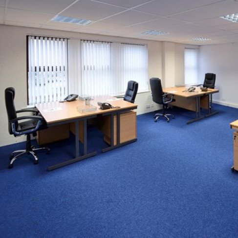 Professional office space in Portal Business Centre for meetings and events, featuring ergonomic chairs.
