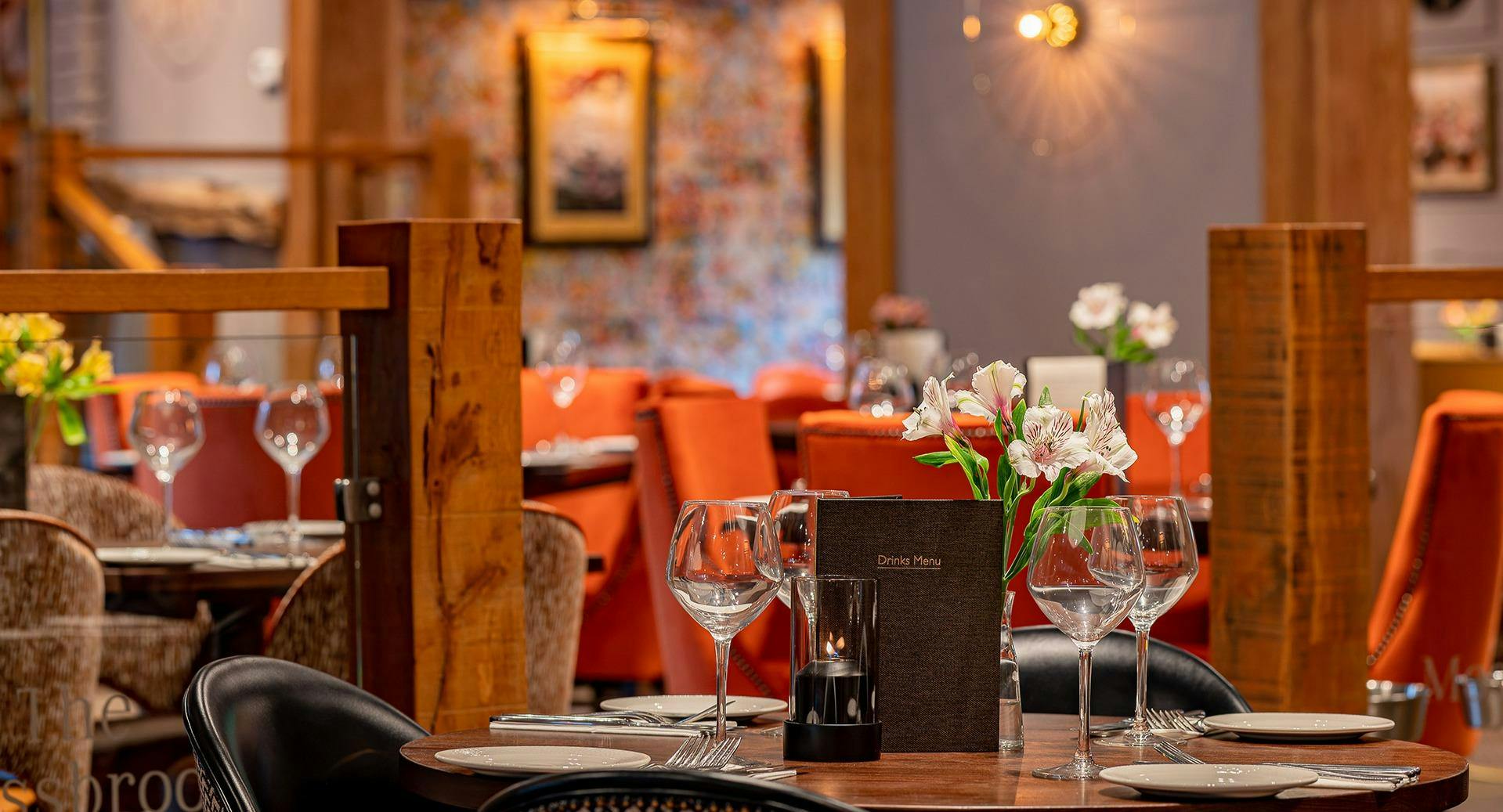 Elegant restaurant setting in The Merlin, perfect for networking and intimate events.