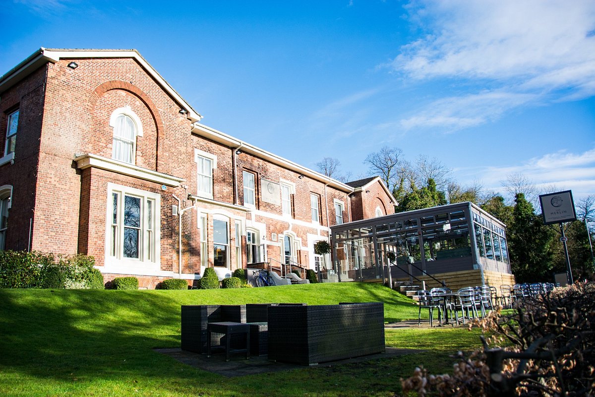 The Garden at The Merlin: charming venue with brick exterior for events and meetings.