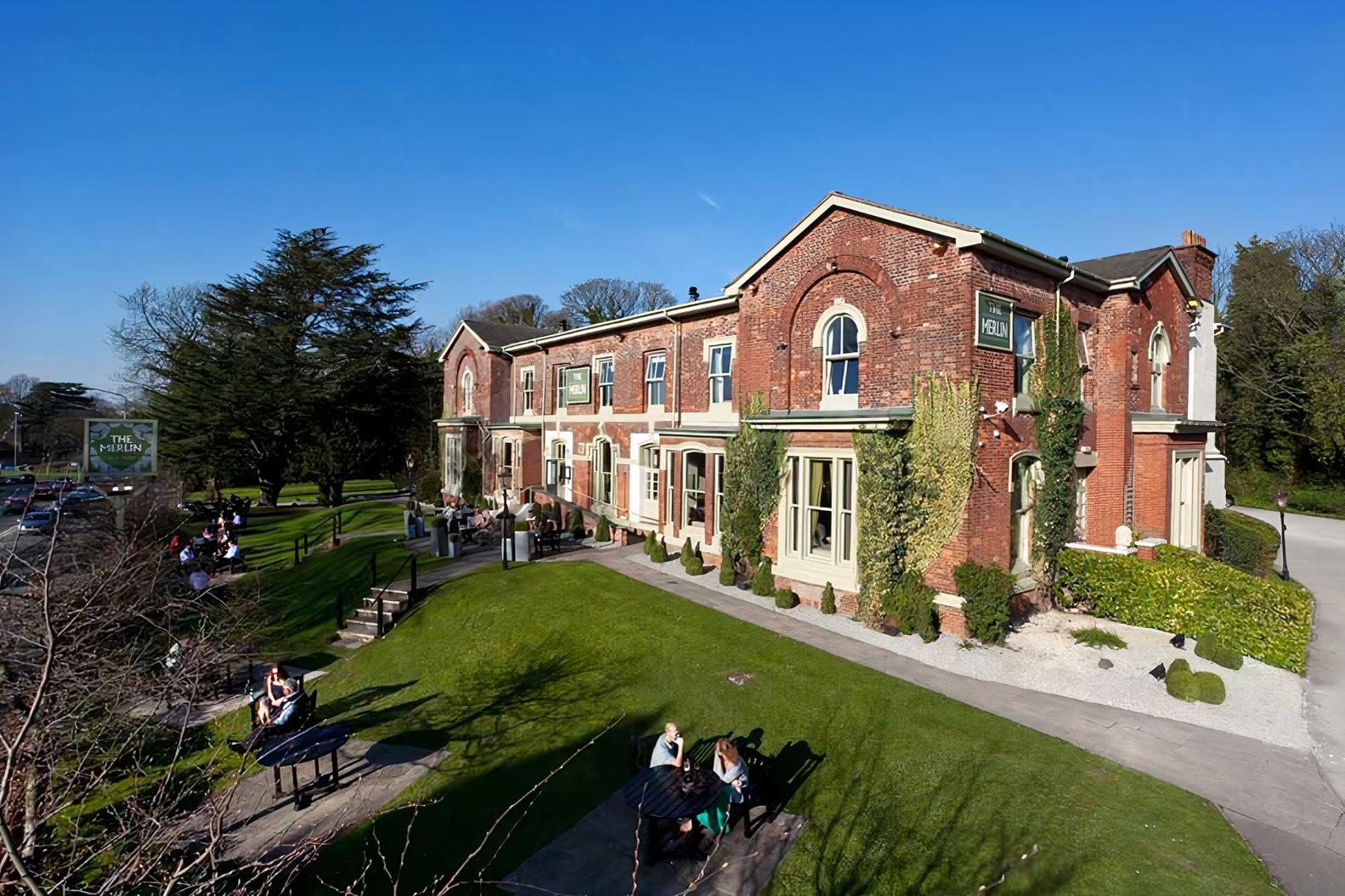 Private dining venue with lush outdoor space, perfect for weddings and corporate events.