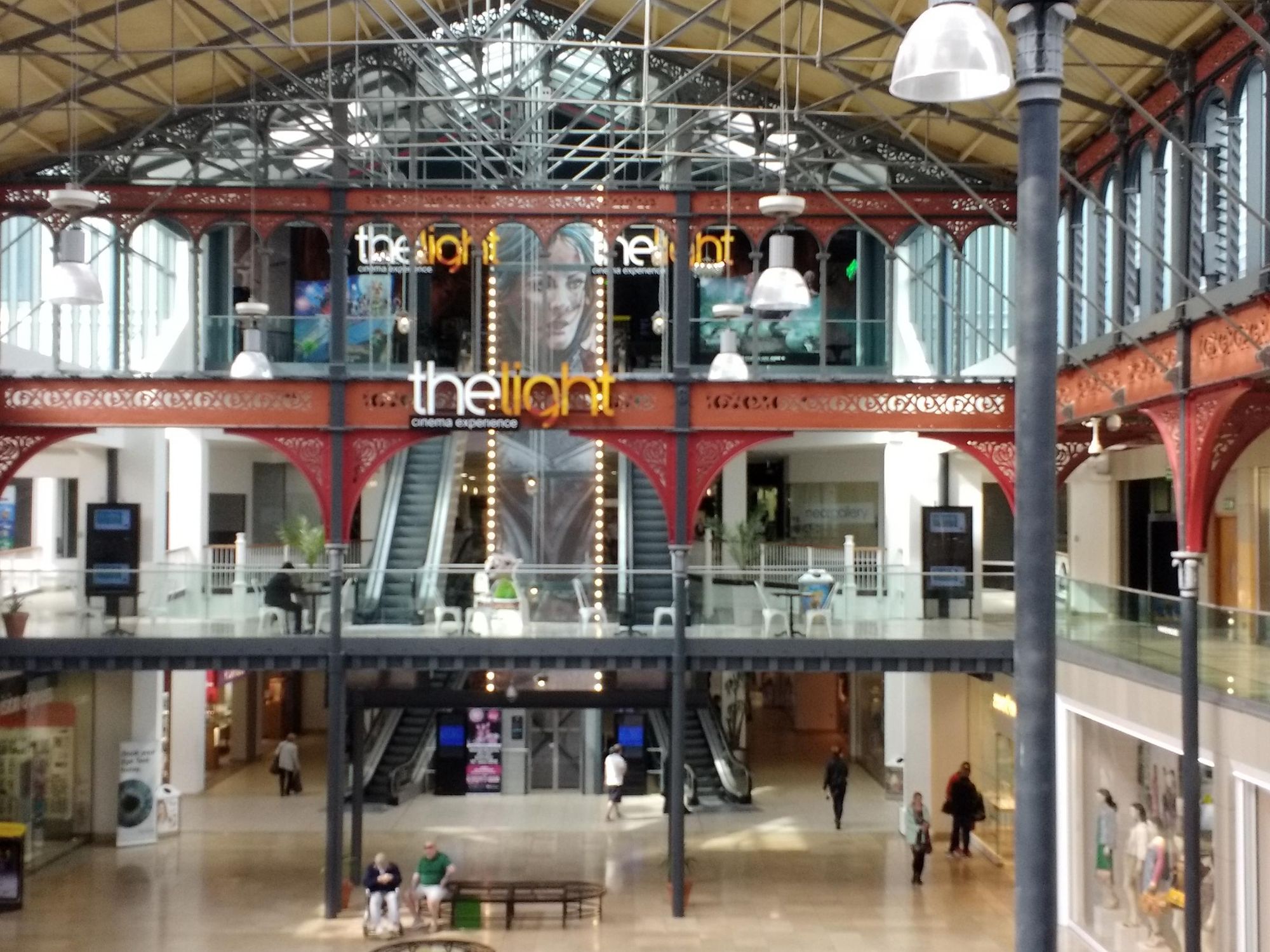 Spacious industrial venue with high ceilings for conferences and social events.