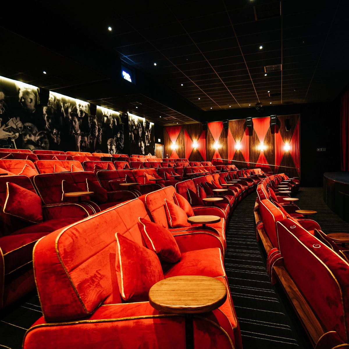 Luxurious Everyman Manchester Screen 3 with plush red seating for private events.