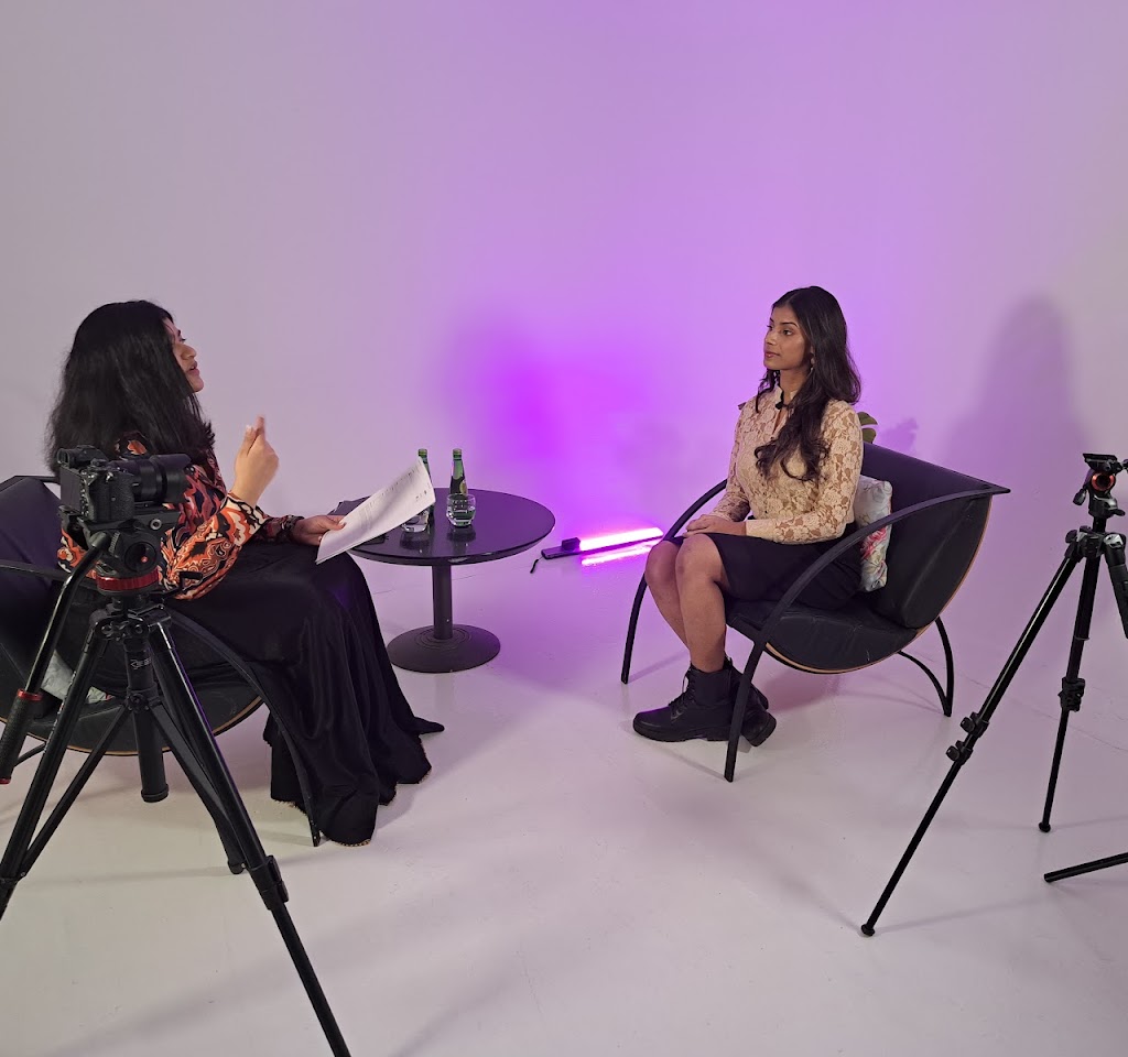 Professional interview setup in minimalist studio, perfect for events and content production.