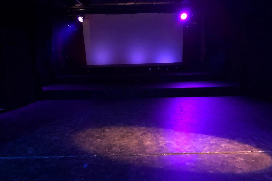 Stage setup with inviting lighting at North West Theatre Arts Company for events.