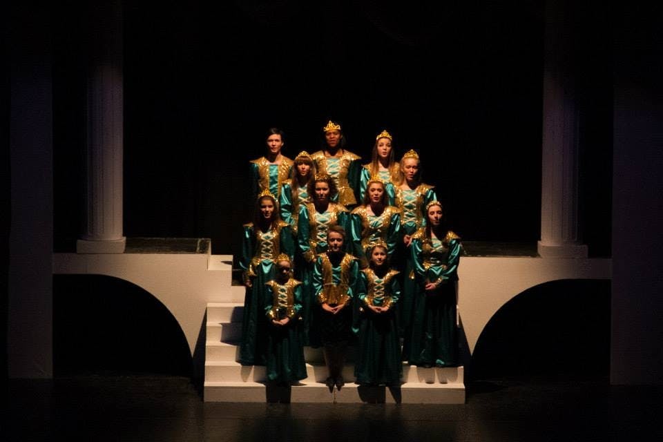 Theatrical performance with elaborate costumes at NWTAC Theatre, event design and lighting.