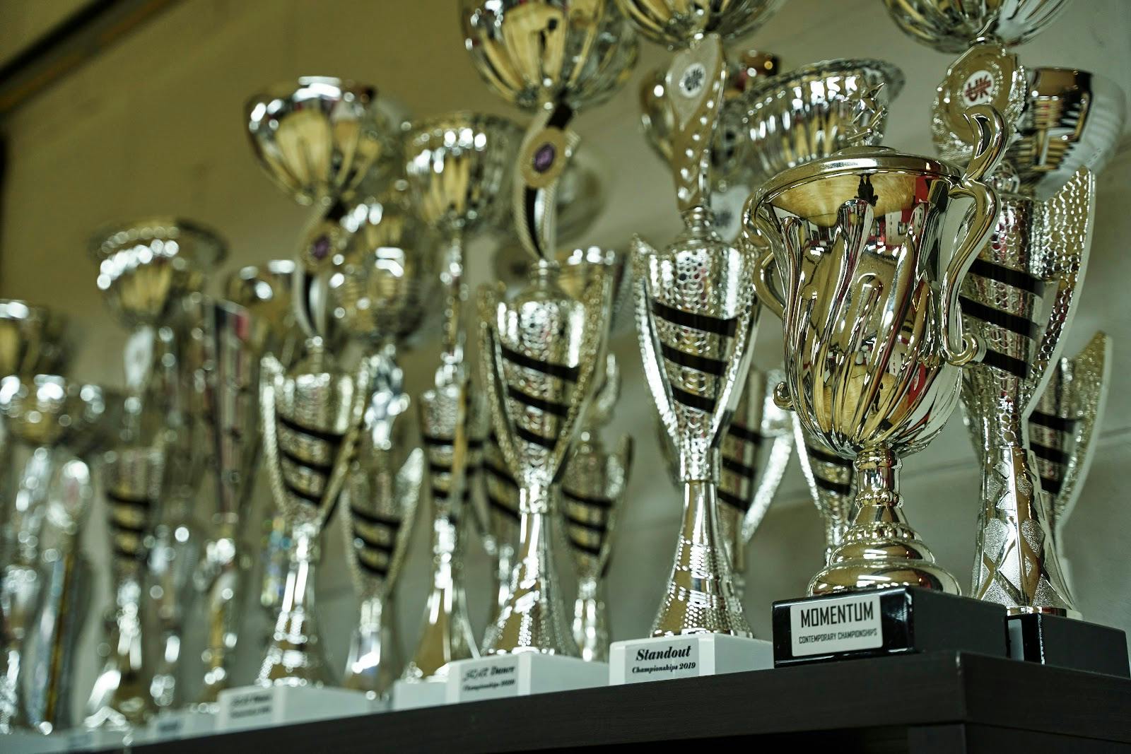 Gleaming trophies at Shirlana: Choreography event, inspiring achievement and recognition.