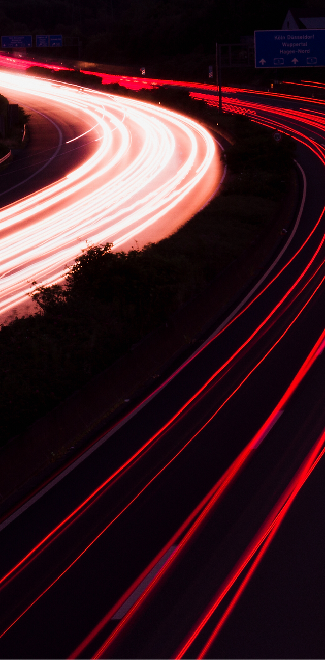 Dynamic meeting space at Open Session Studio Opal with vibrant light streaks for events.