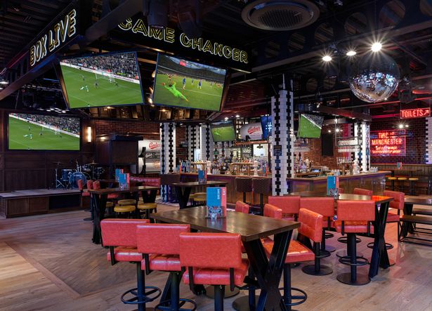 Upstairs Bar at BOX Deansgate: vibrant sports bar for social and corporate events.