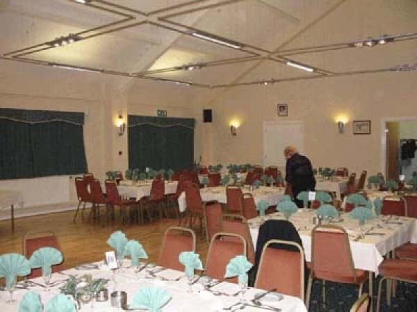 Members Lounge at Unsworth Cricket Club, elegant event space with teal napkins, ideal for banquets.