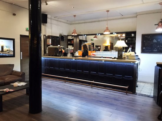 Dining area at The Portland Bar and Grill, modern space for meetings and events.