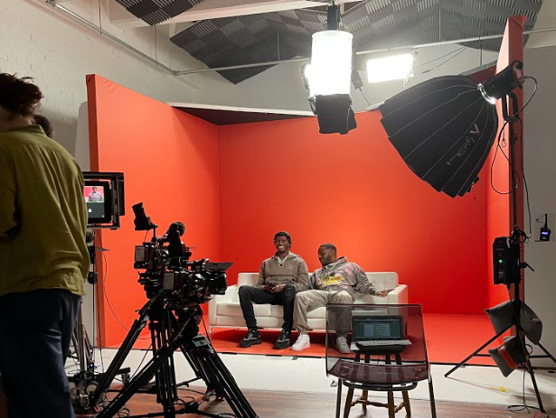 Studio 2 setup with red backdrop, ideal for live events and video shoots.
