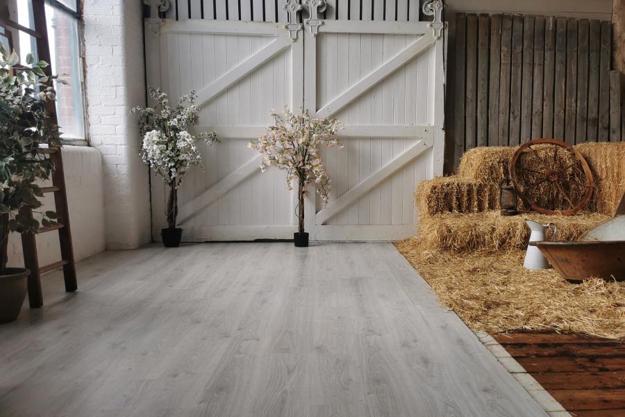 Rustic event space with wooden accents in Montrose Studios, ideal for gatherings and celebrations.