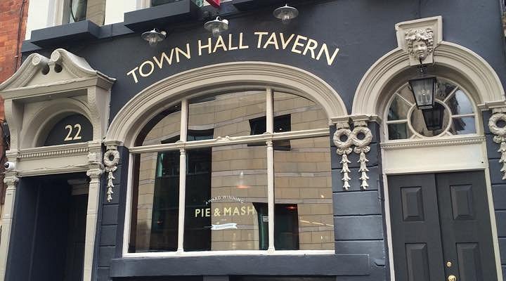"Charming Town Hall Tavern exterior, ideal for casual meetings and events."