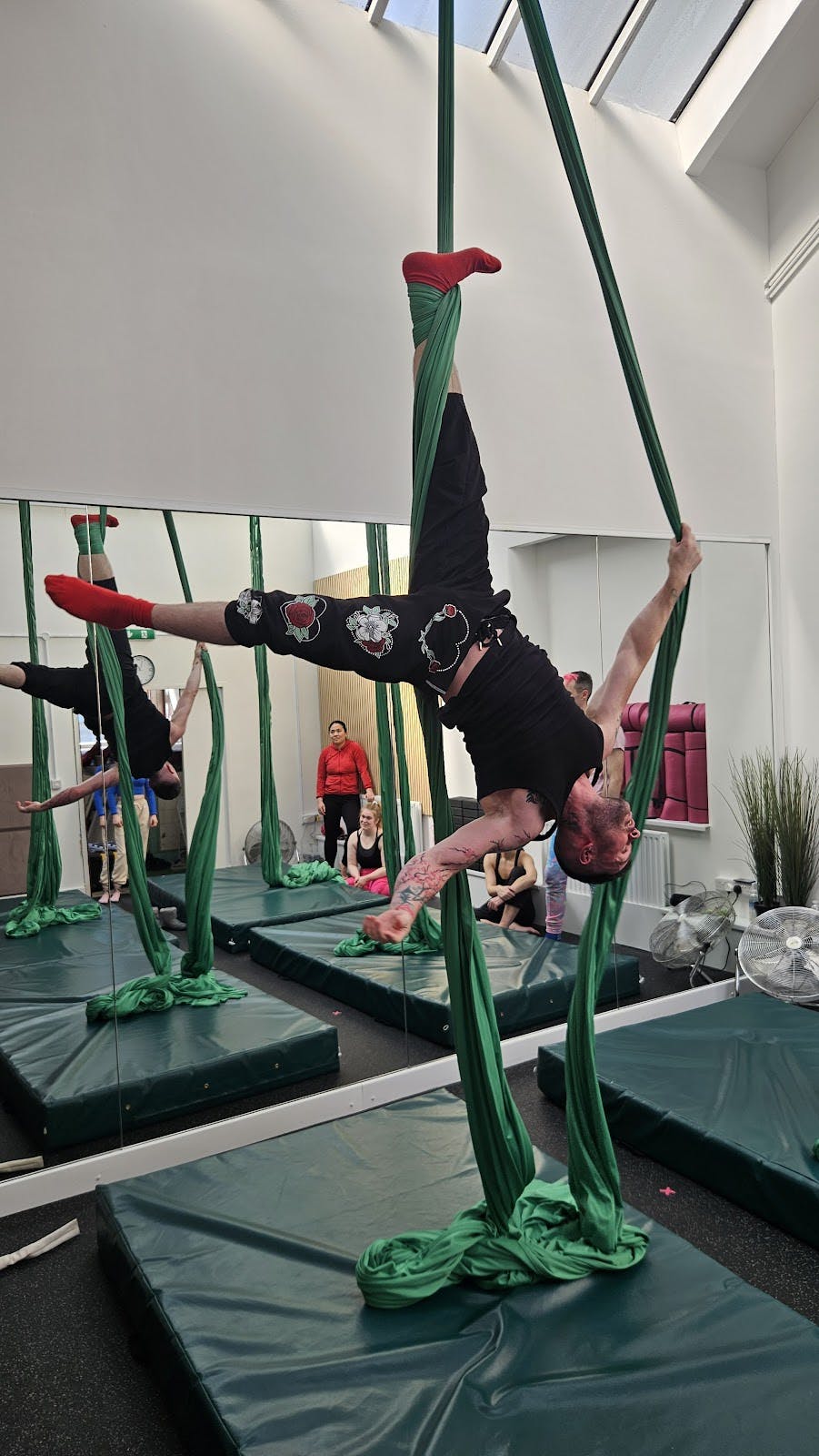 Aerial performance on silks in GFFdamian Dance Studio, perfect for events and workshops.