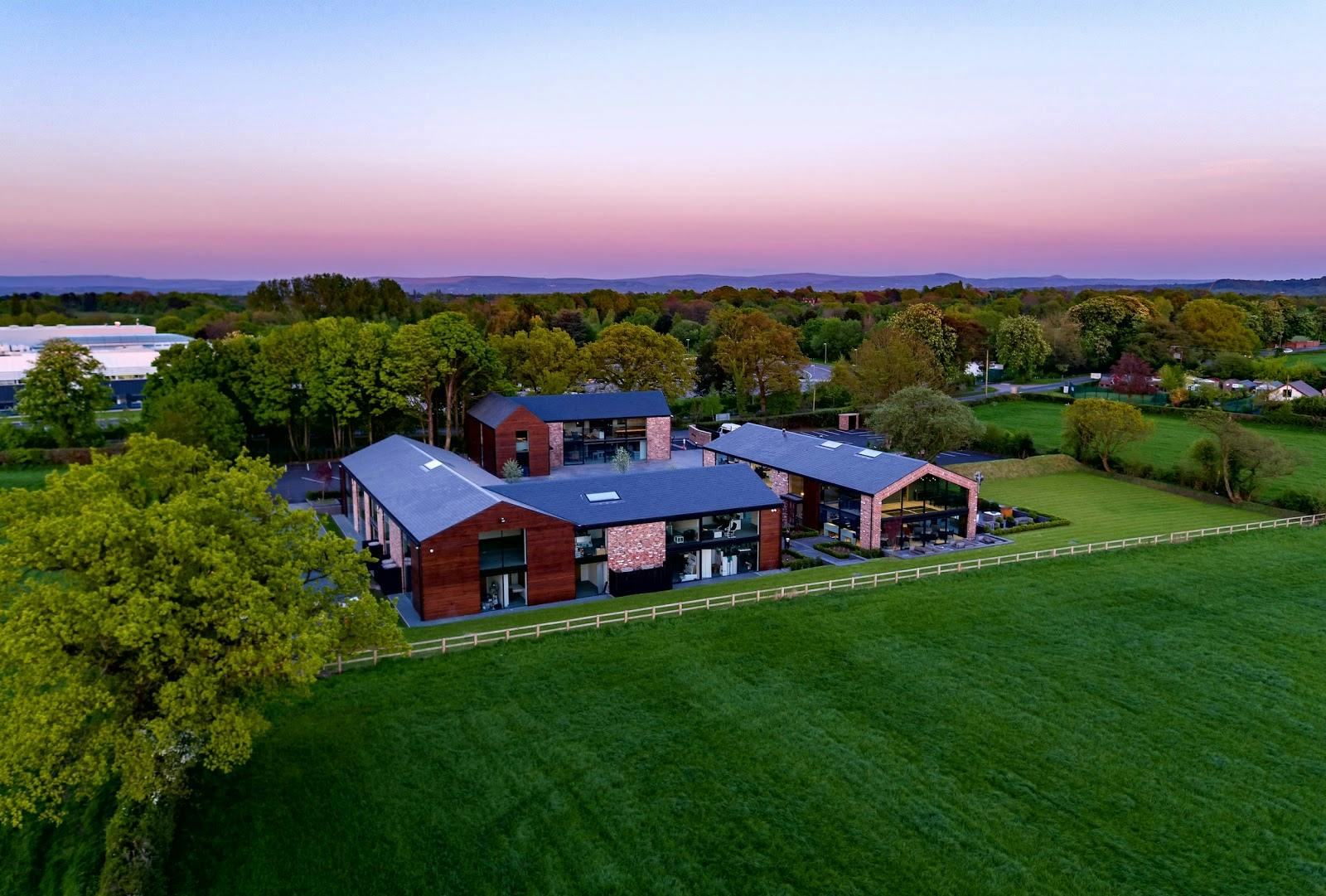 Outdoor meeting rooms with modern architecture for weddings and corporate retreats.