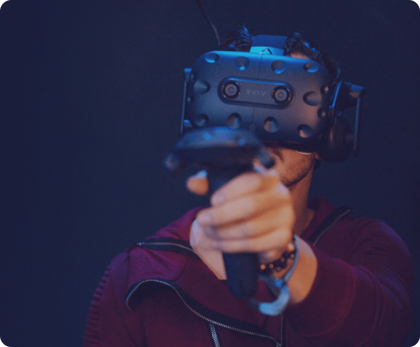Ubisoft VR escape room participant using immersive technology for engaging events.