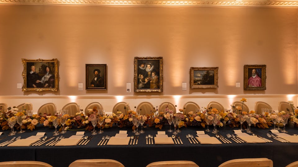 Elegant banquet setup with floral centerpiece for upscale events in Private Spaces.