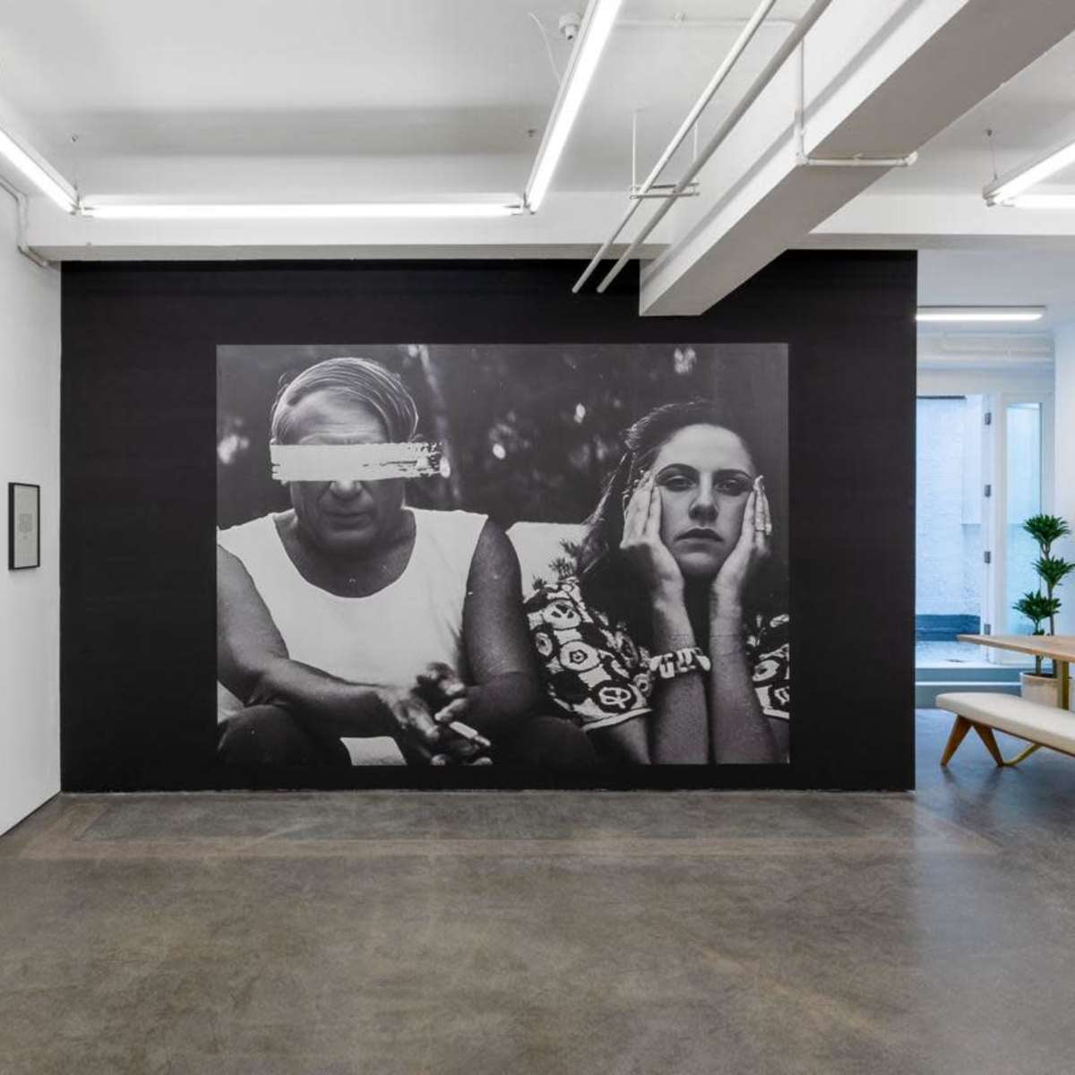 Black-and-white mural in modern event venue, ideal for creative workshops and meetings.