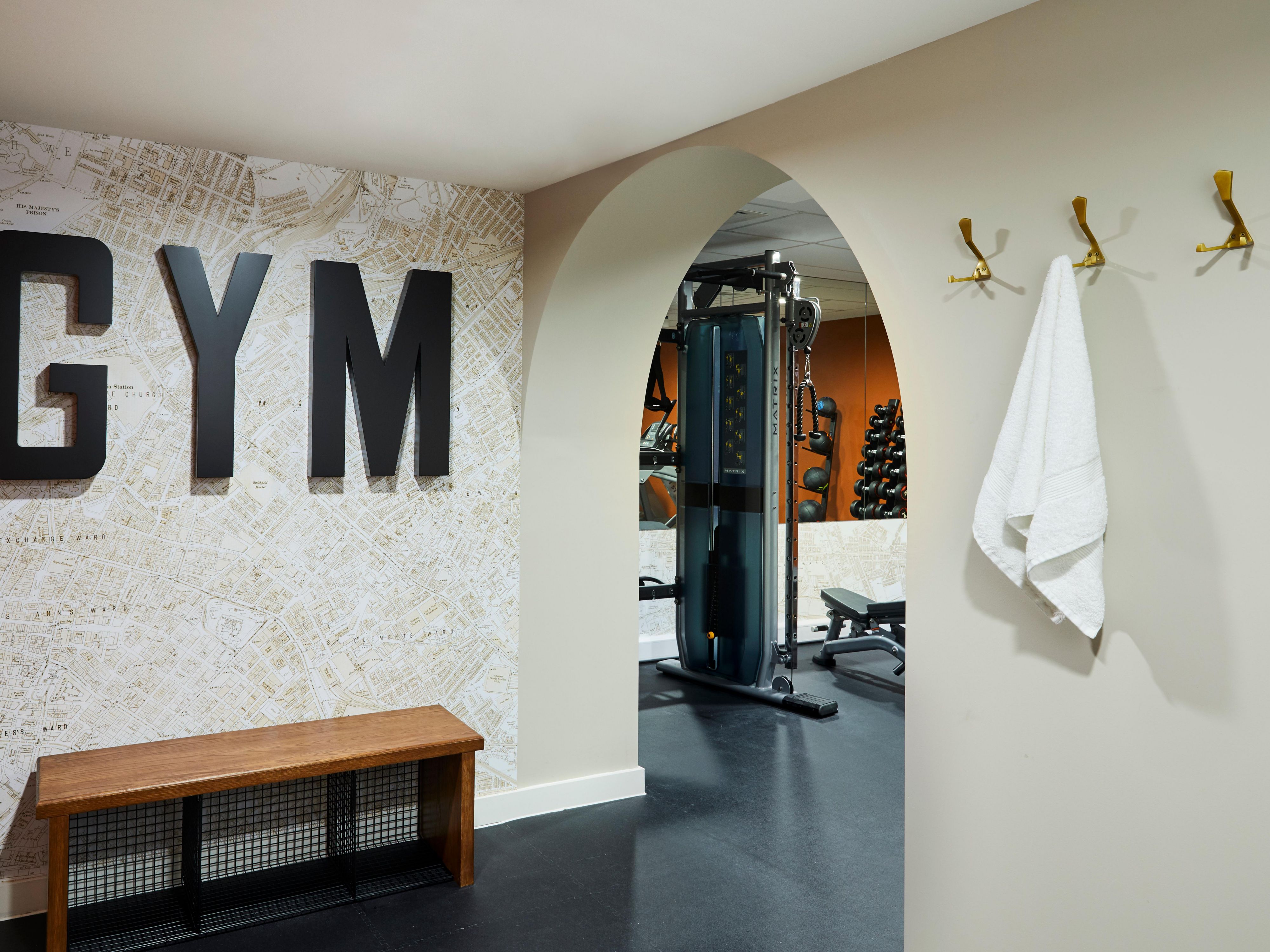 Modern gym area at Hotel Indigo Manchester for wellness events and fitness classes.