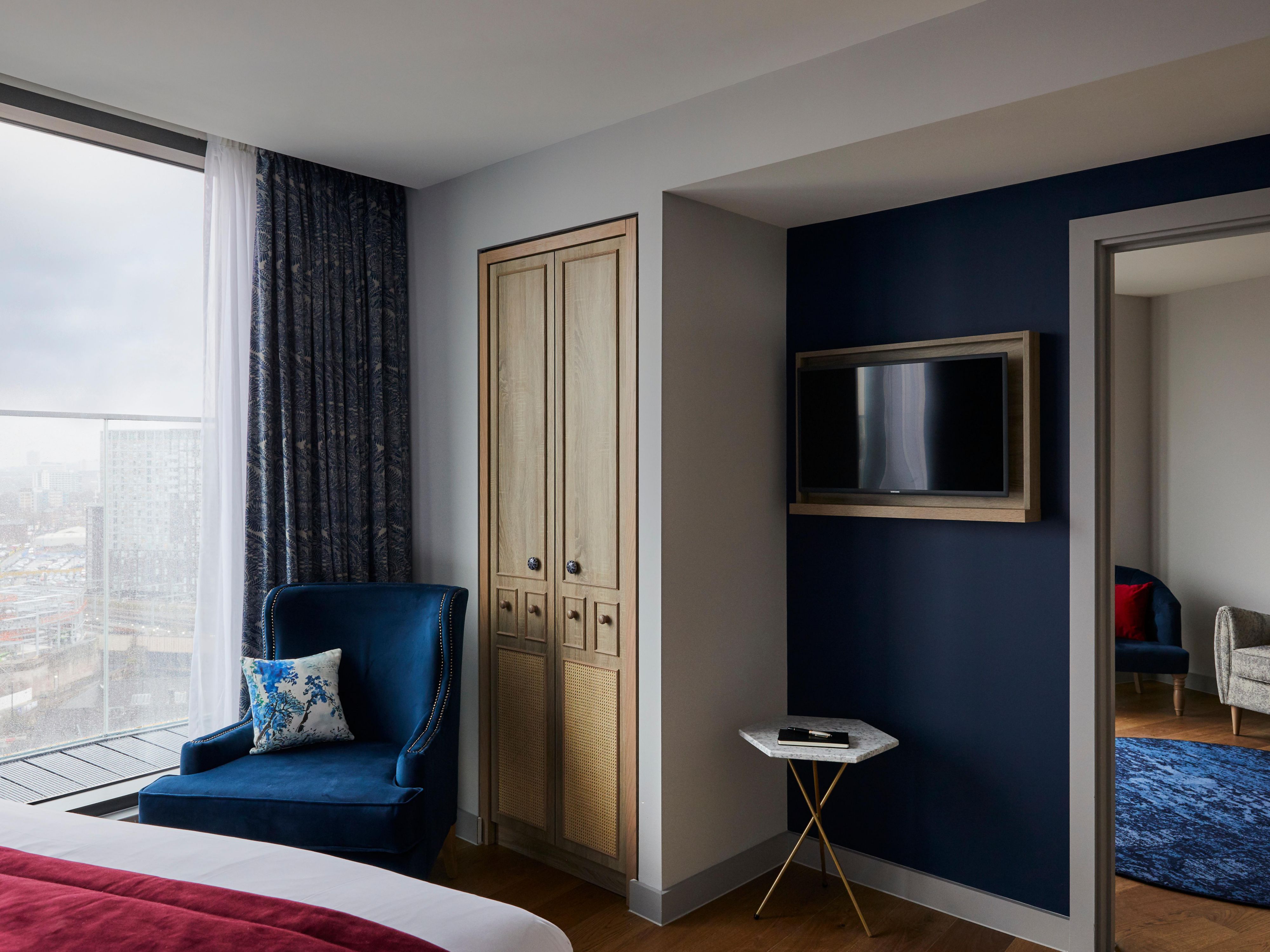 Modern hotel suite at Hotel Indigo Manchester, ideal for corporate meetings and presentations.