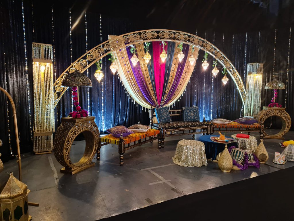 Elegant conference center backdrop with ornate arch, ideal for events and gatherings.
