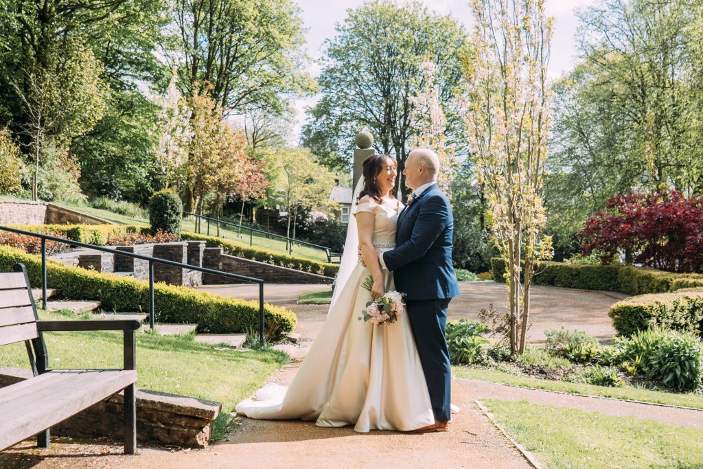 Outdoor wedding venue at The Ashcroft with lush greenery for memorable events.