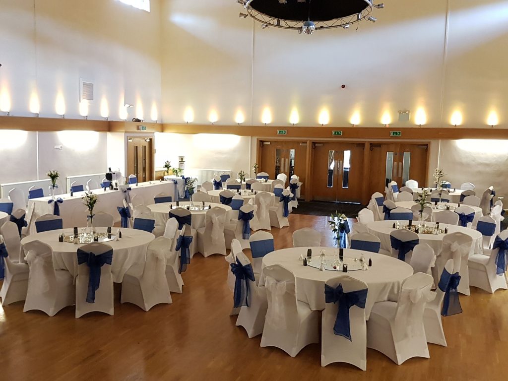 Elegant banquet hall in Ashcroft with white linens, ideal for weddings and corporate events.