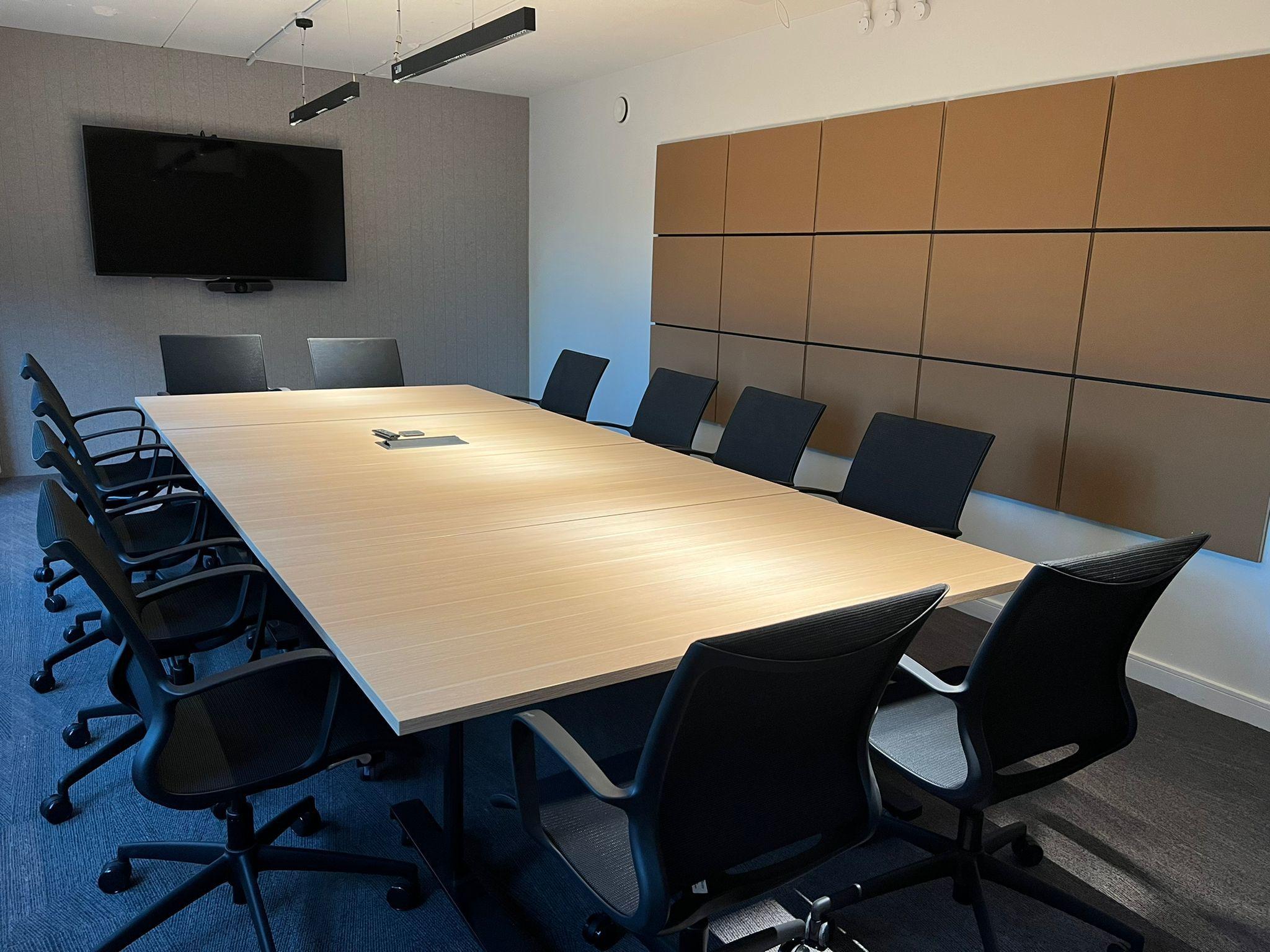 "Modern Manchester conference room with ergonomic chairs for productive meetings"