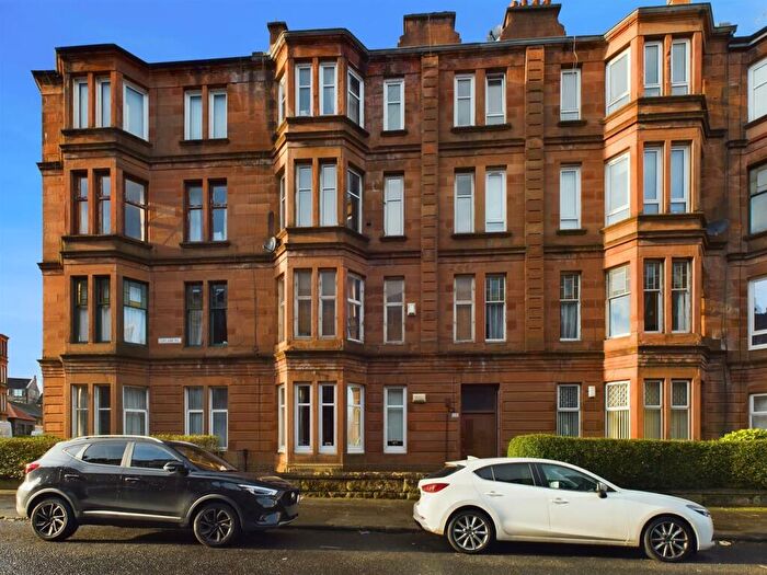 Classic red sandstone apartment block in G51 2XD, perfect for intimate gatherings and events.