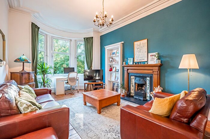 Cozy living room with natural light, ideal for intimate meetings and brainstorming sessions.