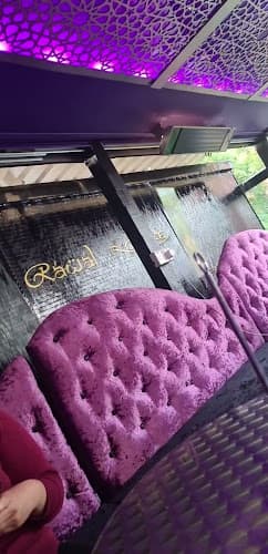 Vibrant purple seating in John Street Family Stand for stylish events and gatherings.