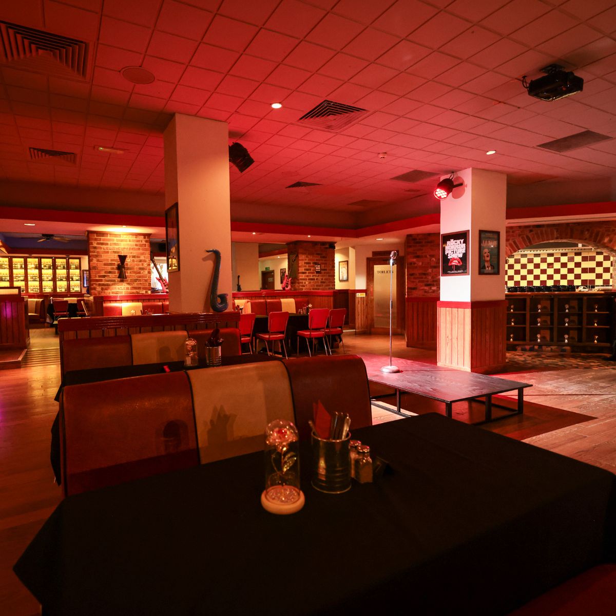 Dining area at Karen's Diner, warm ambiance for events and meetings.