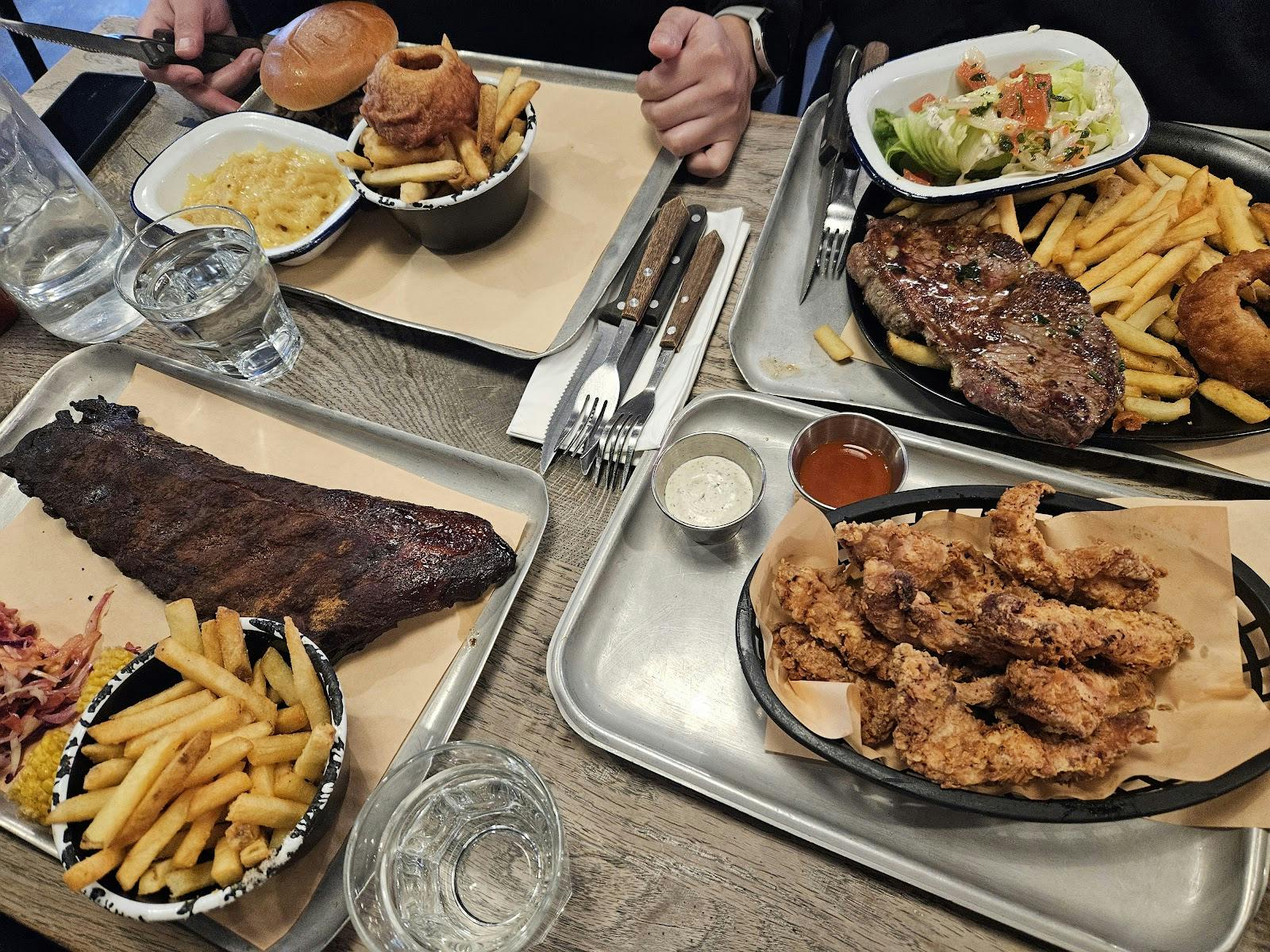 Casual banquet setting at Red's True Barbecue Leeds, ideal for networking events.