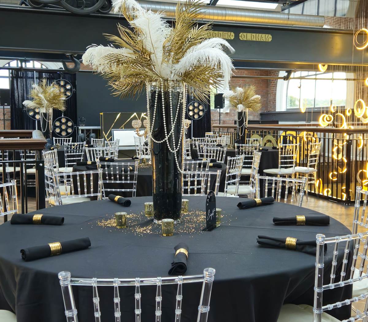 Chic conference room with elegant tables, ideal for corporate events and celebrations.