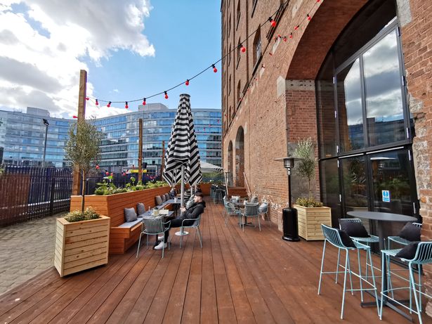 Outdoor terrace in All Bar One Manchester, stylish seating for events, ideal for receptions.
